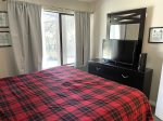 Mammoth Lakes Condo Rental Sunshine Village 114: Master Bedroom Flat Screen TV and Large Window